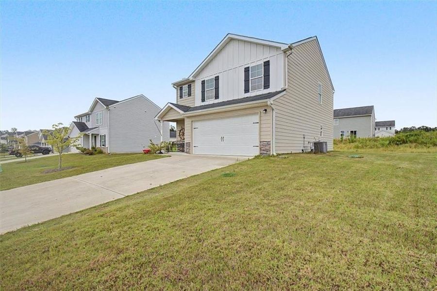 Front exterior of a new home in Kingston Park, Kingston, GA, highlighting curb appeal (Image 22).