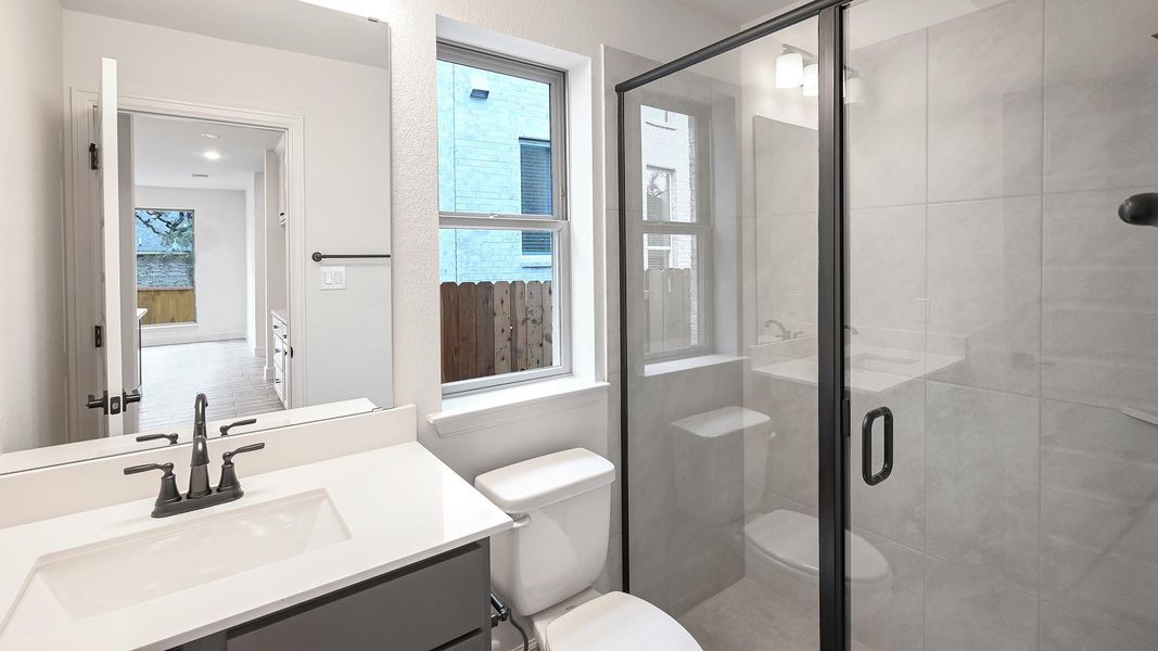 Furnished interior view inside a new home in 6 Creeks, Kyle (Image 14).