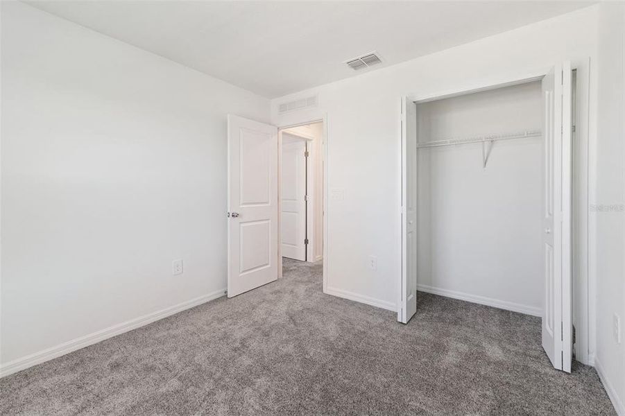 Spacious, unfurnished interior of a new home in Peace Creek Reserve: Legacy Collection, Winter Haven (Image 15). Spacious, unfurnished interior of a new home in Peace Creek Reserve: Legacy Collection, Winter Haven (Image 15).