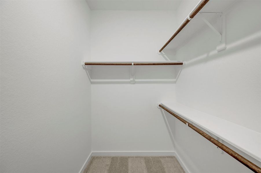 One of two walk-in closets in the primary suite