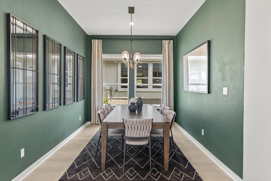 Representative furnished interior of a home built from the Peyton by Chesmar Homes in University Heights, Round Rock (Image 7).