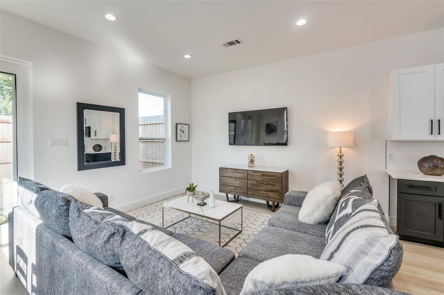 Living room featuring light hardwood / wood-style flooring