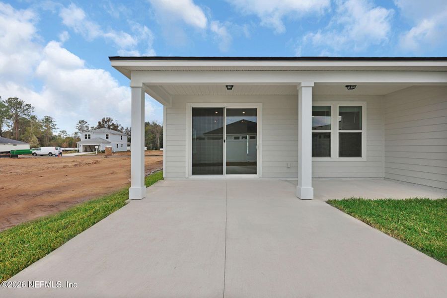 Exterior details and patio area of a home in Murray Farms, Middleburg (Image 18).