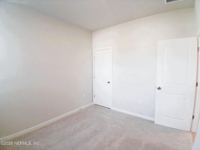 Spacious, unfurnished interior of a new home in Seminole Palms, Palm Coast (Image 12).