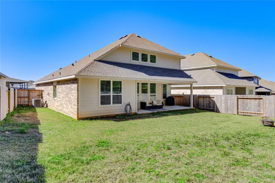 Front exterior of a new home in Fairwater, Montgomery, TX, highlighting curb appeal (Image 1). Front exterior of a new home in Fairwater, Montgomery, TX, highlighting curb appeal (Image 1).