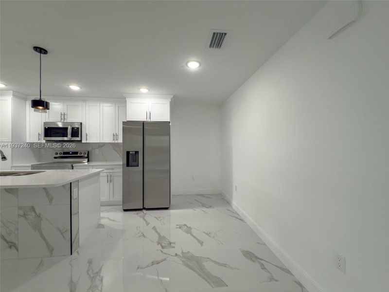 Furnished interior view inside a new home in , Lehigh Acres (Image 13).