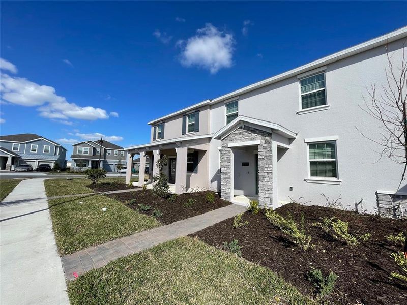 Front exterior of a new home in , Orlando, FL, highlighting curb appeal (Image 14). Front exterior of a new home in , Orlando, FL, highlighting curb appeal (Image 14).