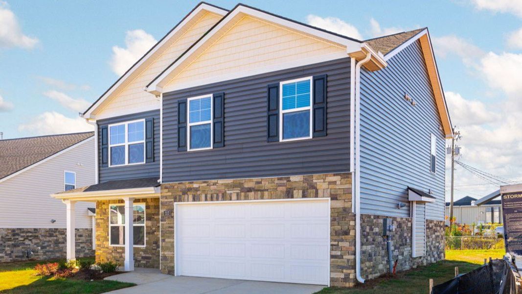 Front exterior of a new home in Price's Crossing, LaFayette, GA, highlighting curb appeal (Image 16).