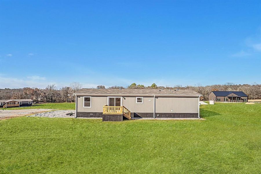 Exterior details and patio area of a home in , Springtown (Image 12).