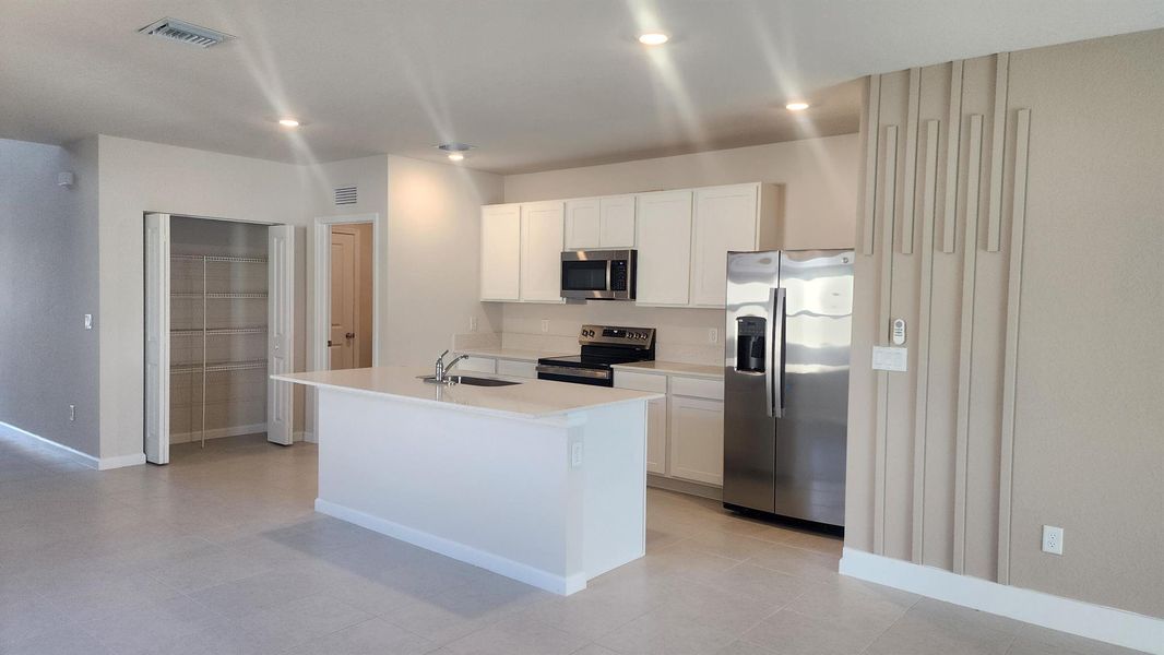 Furnished interior view inside a new home in , Fort Pierce (Image 9).
