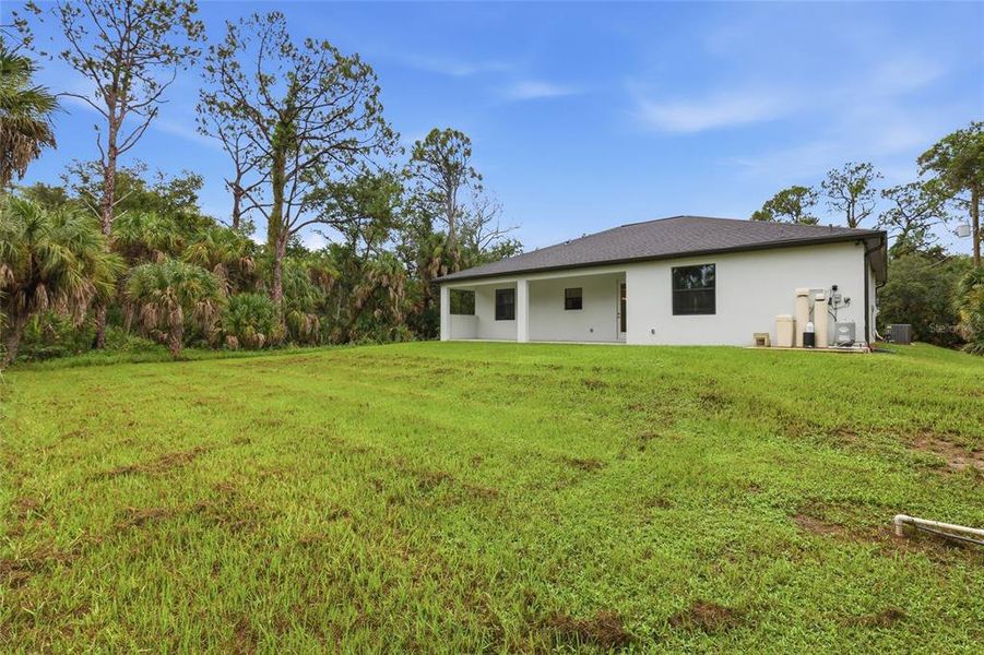 Exterior details and patio area of a home in , Port Charlotte (Image 28).