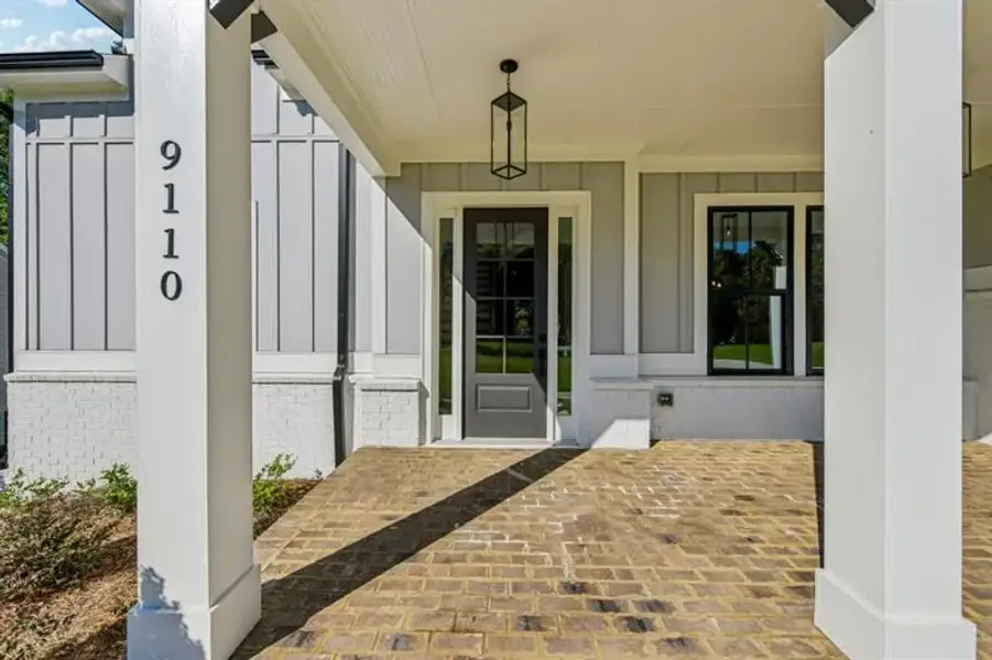 Exterior details and patio area of a home in White Post on Lake Lanier, Gainesville (Image 3).