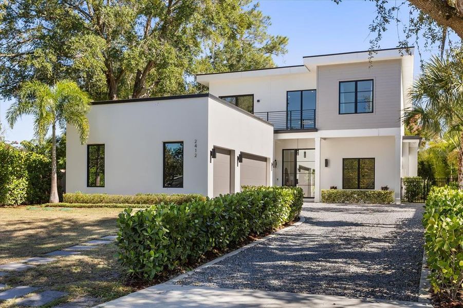 Front exterior of a new home in , Winter Park, FL, highlighting curb appeal (Image 25). Front exterior of a new home in , Winter Park, FL, highlighting curb appeal (Image 25).