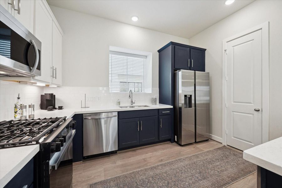 Representative photo showing the community’s model home kitchen. Layout and selections may vary.