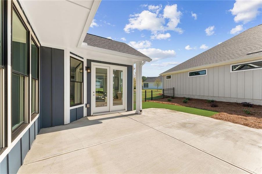 Front exterior of a new home in The Courtyards at Redbud Lane, Canton, GA, highlighting curb appeal (Image 19).