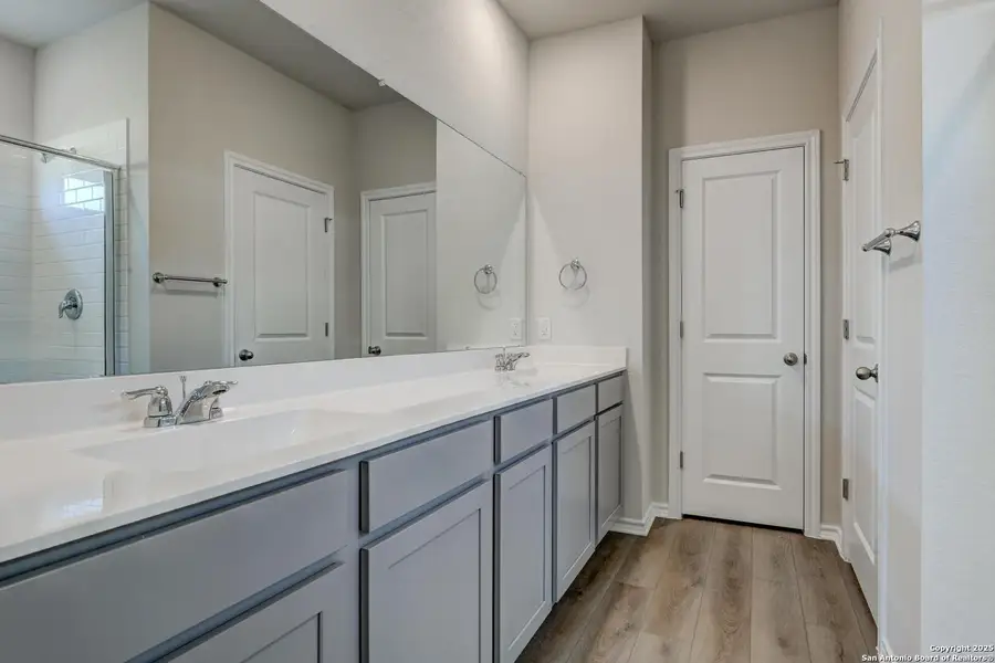 Furnished interior view inside a new home in Meadows at Hennersby Hollow 40's, San Antonio (Image 11).