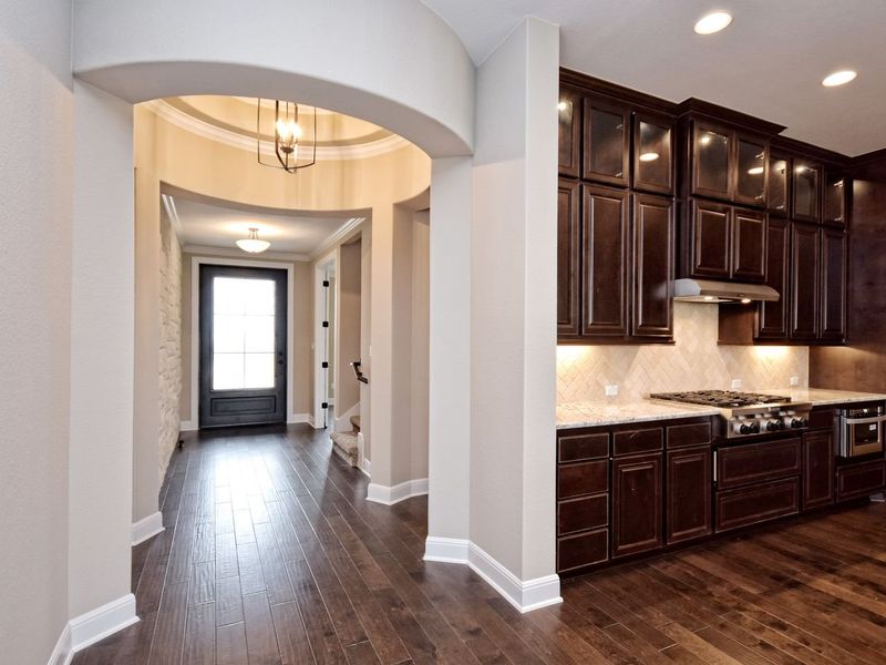 Representative furnished interior of a home built from the Madera II by Giddens Homes in Scofield Farms Estates, Georgetown (Image 205).