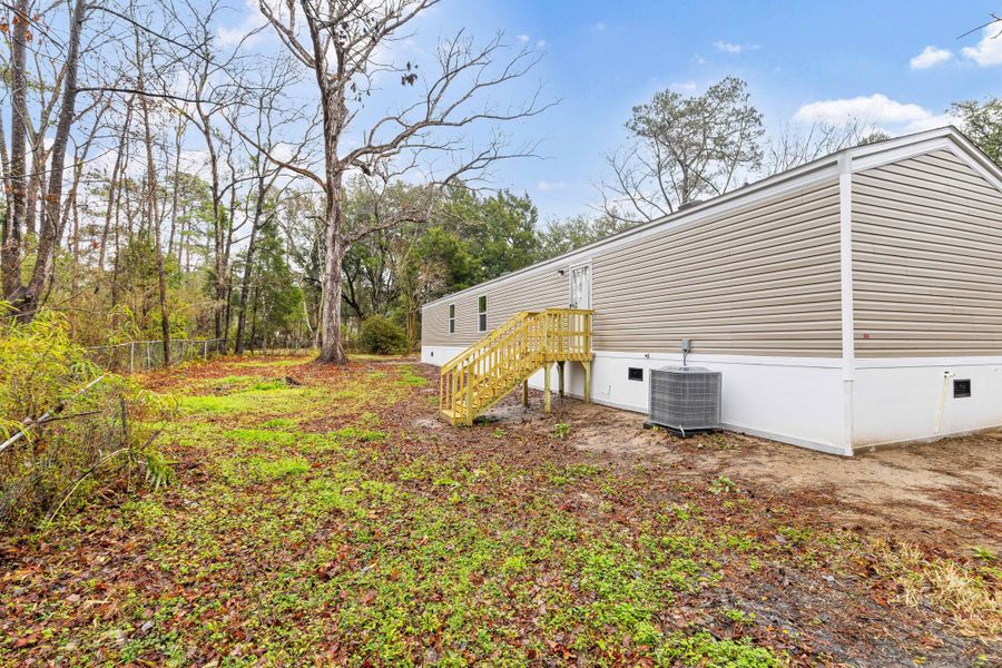 Exterior details and patio area of a home in , Summerville (Image 13).