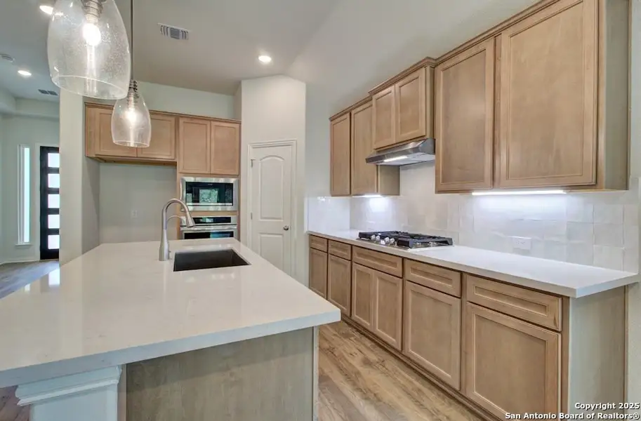 Furnished interior view inside a new home in The Crossvine, Schertz (Image 6).