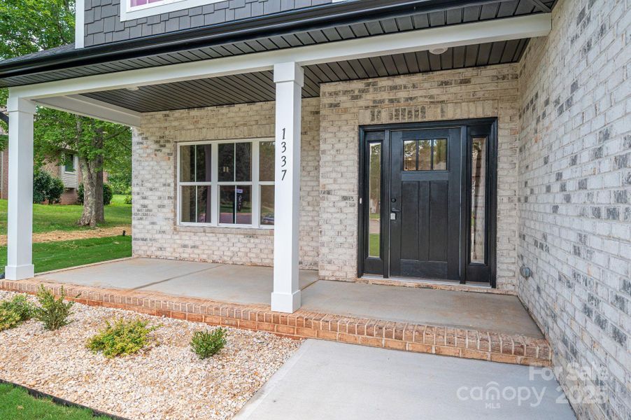 Front exterior of a new home in , Hickory, NC, highlighting curb appeal (Image 1). Front exterior of a new home in , Hickory, NC, highlighting curb appeal (Image 1).