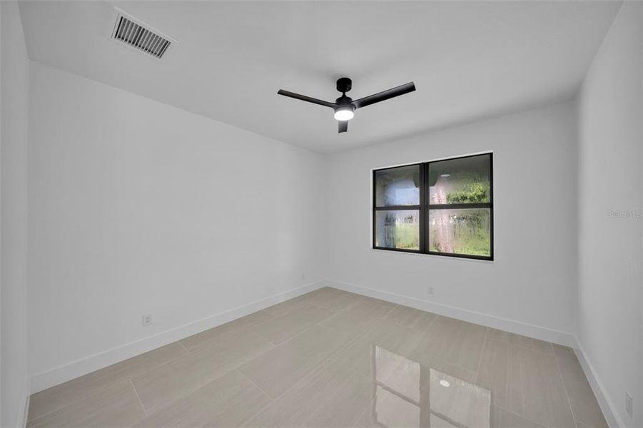 Spacious, unfurnished interior of a new home in , Port Charlotte (Image 12).