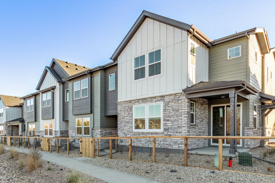 Front exterior of a new home in Arras Park, Thornton, CO, highlighting curb appeal (Image 1).