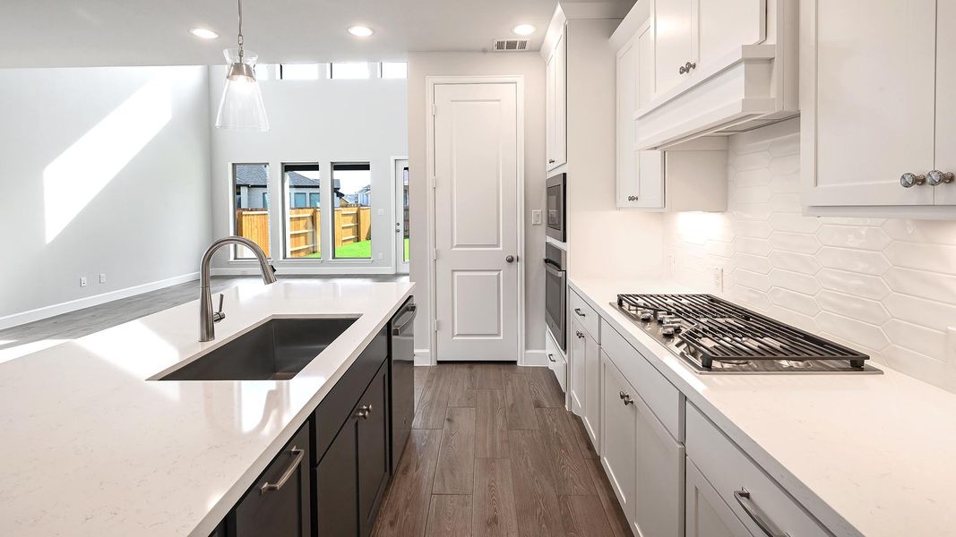 Furnished interior view inside a new home in 6 Creeks 50', Kyle (Image 9).