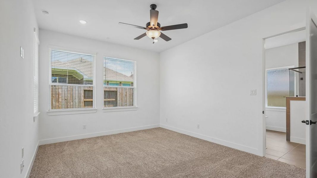 Representative unfurnished interior of a home built from the Oxford by Chesmar Homes in Parkside on the River, Georgetown (Image 23).