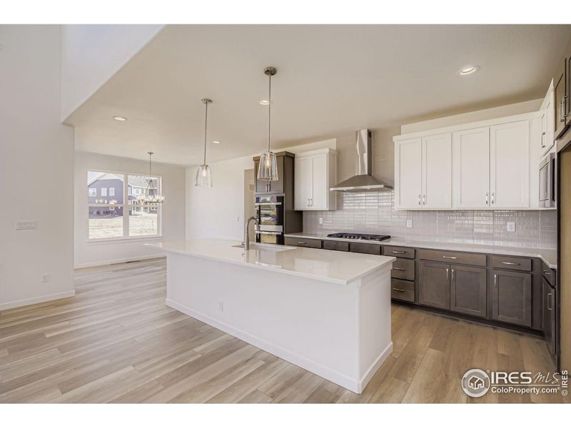 Furnished interior view inside a new home in RainDance - 60s, Windsor (Image 7).