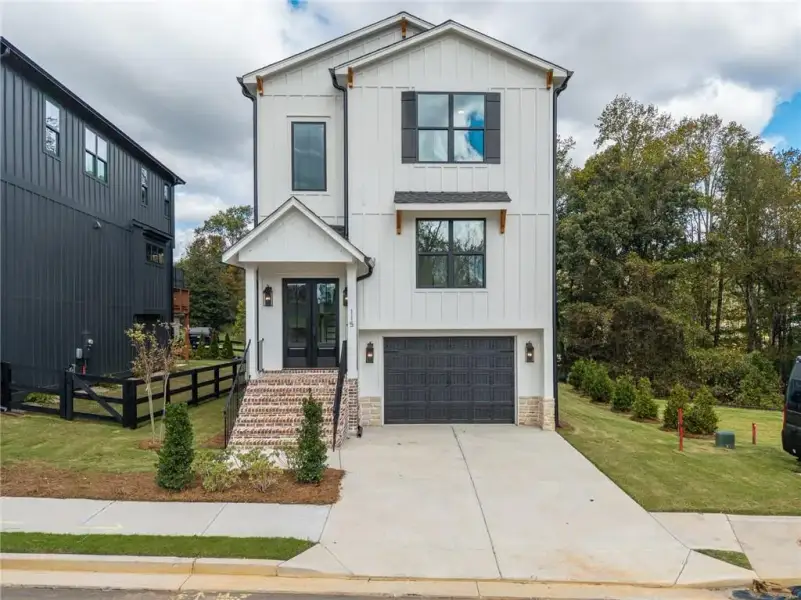 Front exterior of a new home in , Ball Ground, GA, highlighting curb appeal (Image 25).