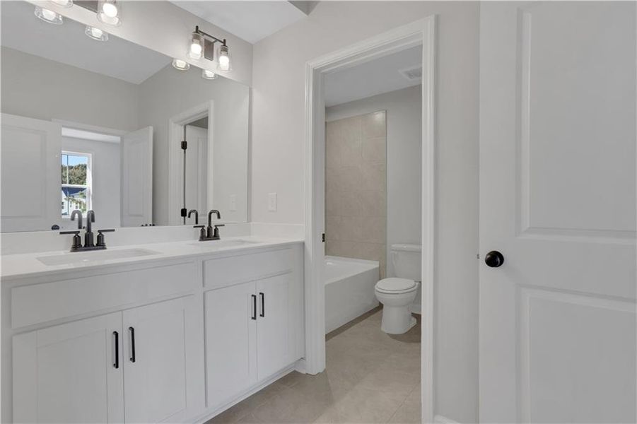Furnished interior view inside a new home in The Paddocks at Doc Hughes, Buford (Image 6).