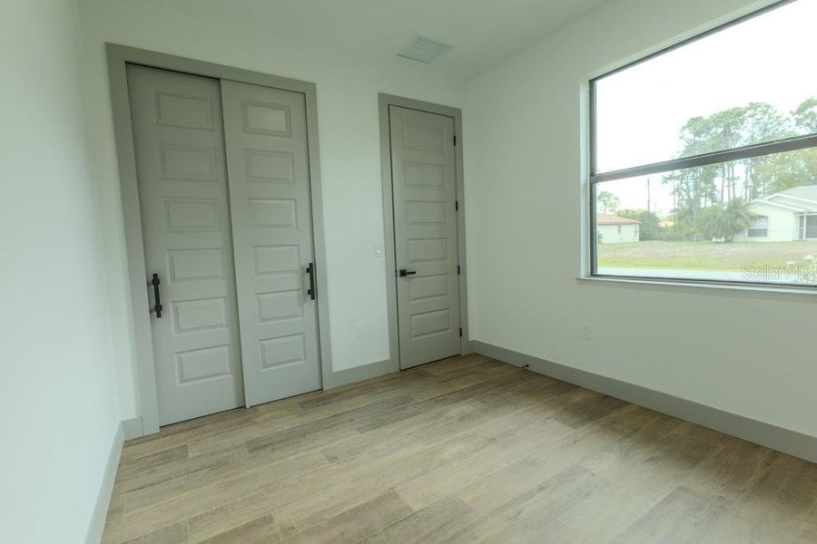 Spacious, unfurnished interior of a new home in , North Port (Image 18). Spacious, unfurnished interior of a new home in , North Port (Image 18).