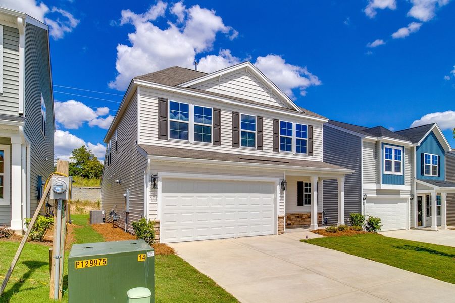 Front exterior of a new home in Bluefield, Lexington, SC, highlighting curb appeal (Image 21).