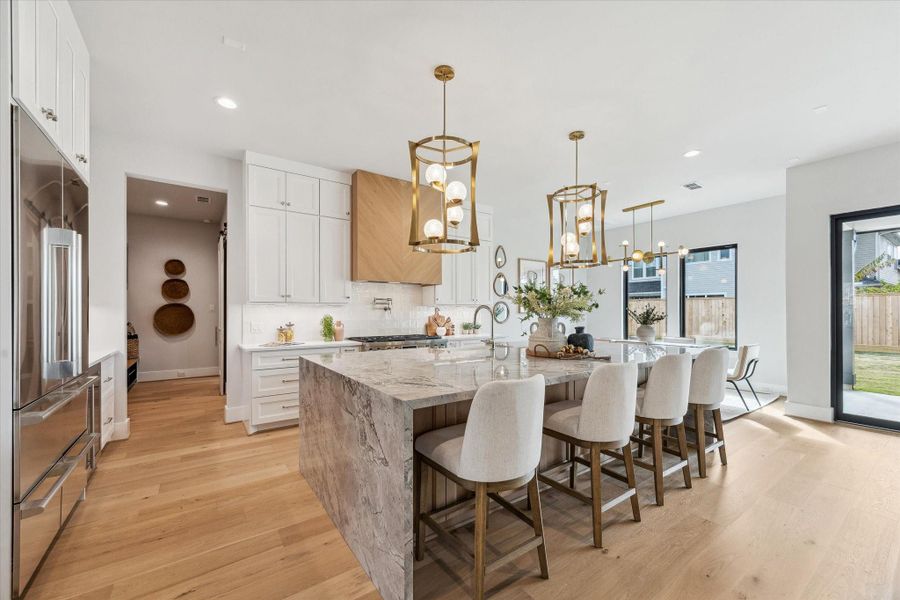 Stunning waterfall island with ample storage.