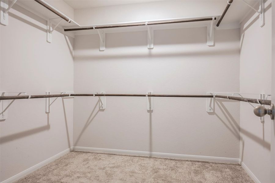 Spacious, unfurnished interior of a new home in Sunterra, Katy (Image 32).