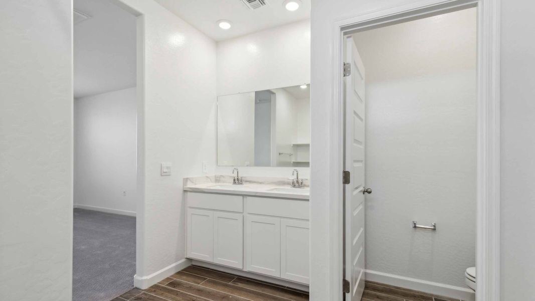 Furnished interior view inside a new home in Radiance at Superstition Vistas, Mesa (Image 11).