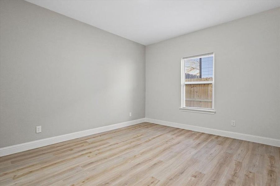 Unfurnished room featuring light hardwood / wood-style floors