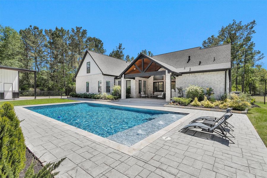 Resort-style pool with expansive deck