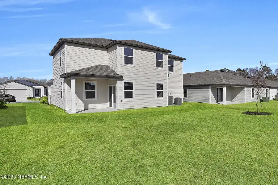 Exterior details and patio area of a home in Westport Landing, Jacksonville (Image 3).