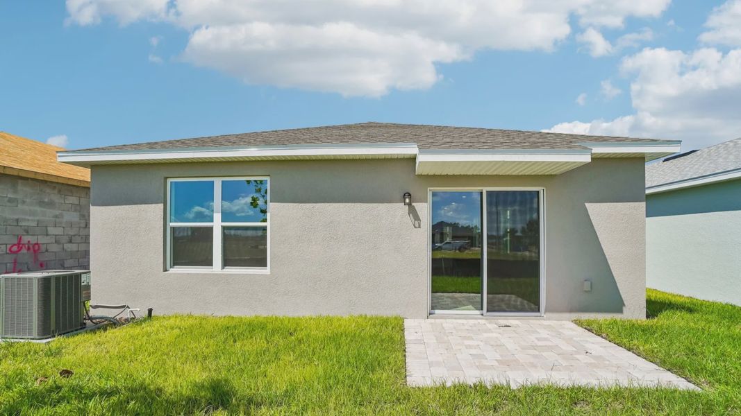 Exterior details and patio area of a home in Willowbrook North, Winter Haven (Image 22).