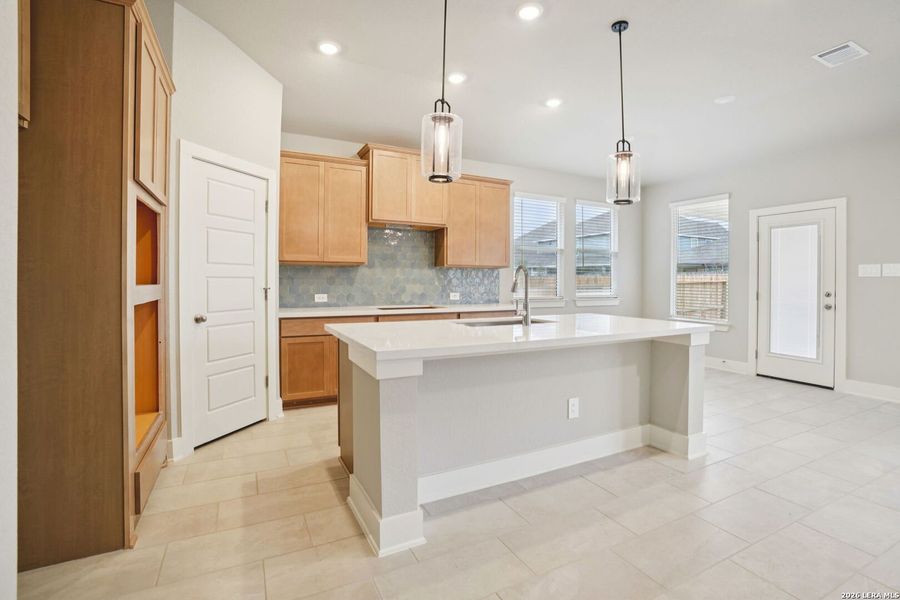 Furnished interior view inside a new home in Estancia Ranch - Classic Series, San Antonio (Image 17).