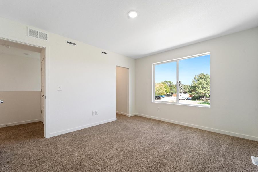 Spacious, unfurnished interior of a new home in Conestoga, Ault (Image 18).
