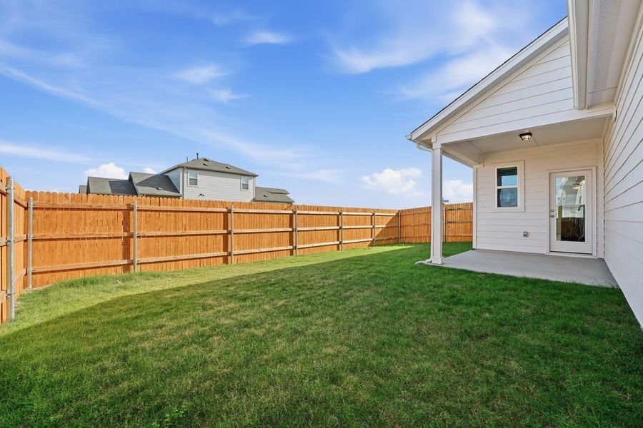 Exterior details and patio area of a home in Longview, Del Valle (Image 3).