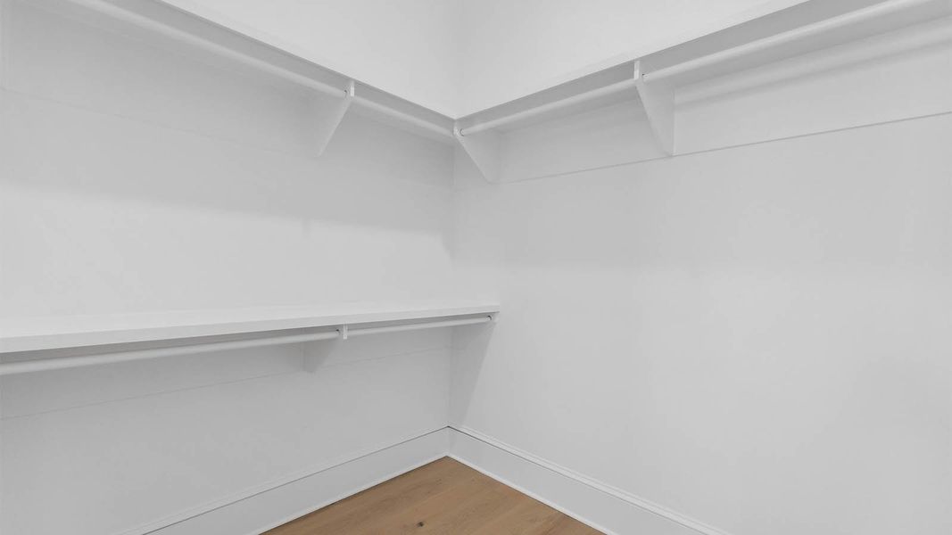 Representative unfurnished interior of a home built from the Cayman by D.R. Horton in Parkside, Santa Rosa Beach (Image 34).