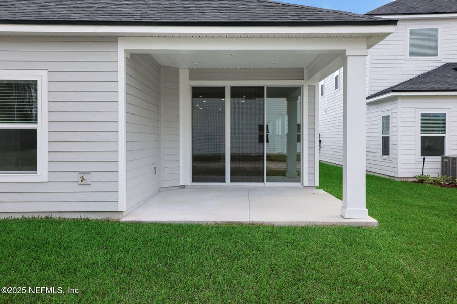 Exterior details and patio area of a home in Brook Forest, St. Augustine (Image 3).