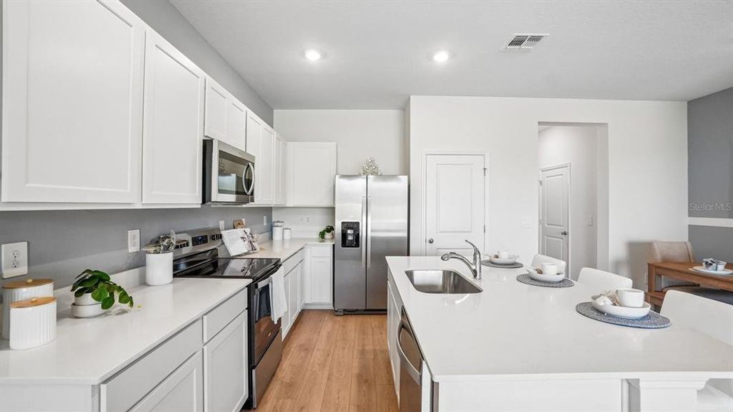 Furnished interior view inside a new home in Sanctuary at Citrus Park Townhomes, Tampa (Image 13).