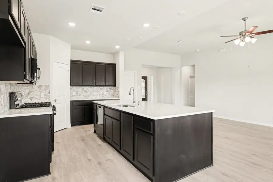Furnished interior view inside a new home in Clear View Estates, Willis (Image 6).