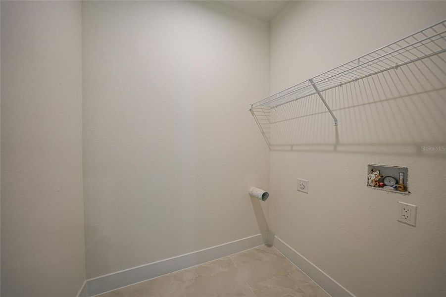 Spacious, unfurnished interior of a new home in , Port Charlotte (Image 40).