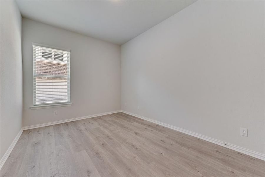 Empty room featuring light hardwood / wood-style floors