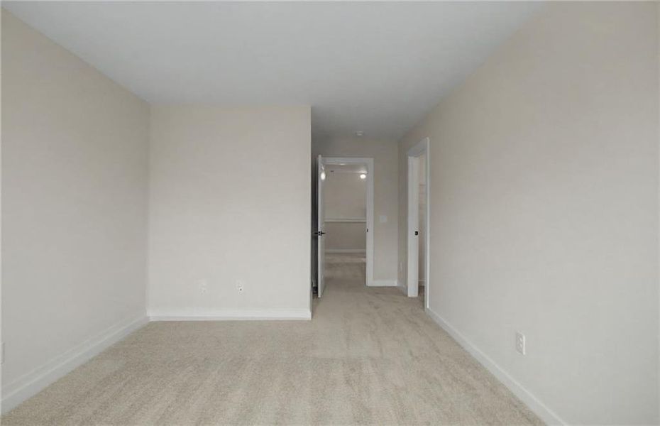 Spacious, unfurnished interior of a new home in The Park at Brighton, Locust Grove (Image 25).